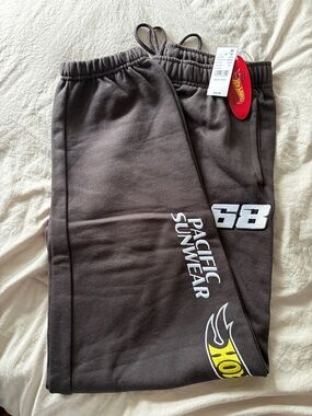 Pacific Sunwear womens Black Sweatpants with White and Yellow Graphics